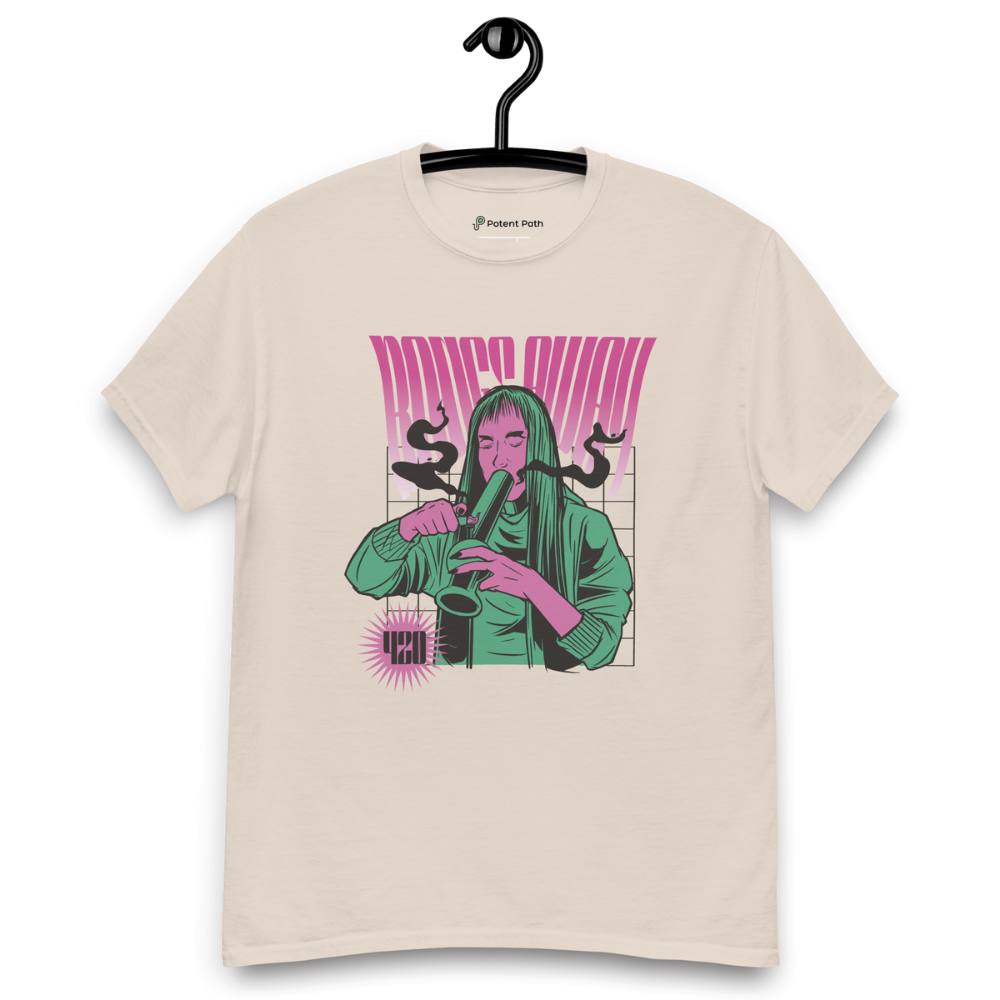 Beige T-shirt on a hanger featuring a stylised illustration of a woman with long hair lighting a bong, and the text "BONGS AWAY" distorted above her, along with a small "420" emblem at the bottom left