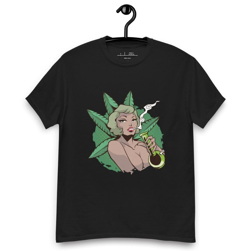 Black T-shirt on a hanger featuring a graphic on the chest of a pin-up style woman smoking a joint, framed by large green cannabis leaves
