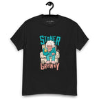 Black T-shirt on a hanger featuring a cartoon illustration of an elderly woman in a teal tracksuit sitting in an armchair, holding a yellow bong, with the text "STONER GRANNY" above and below her.