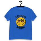 Blue T-shirt on a hanger with a yellow smiley face with droopy, bloodshot eyes and the phrase "STONED MOOD" printed above and below the graphic