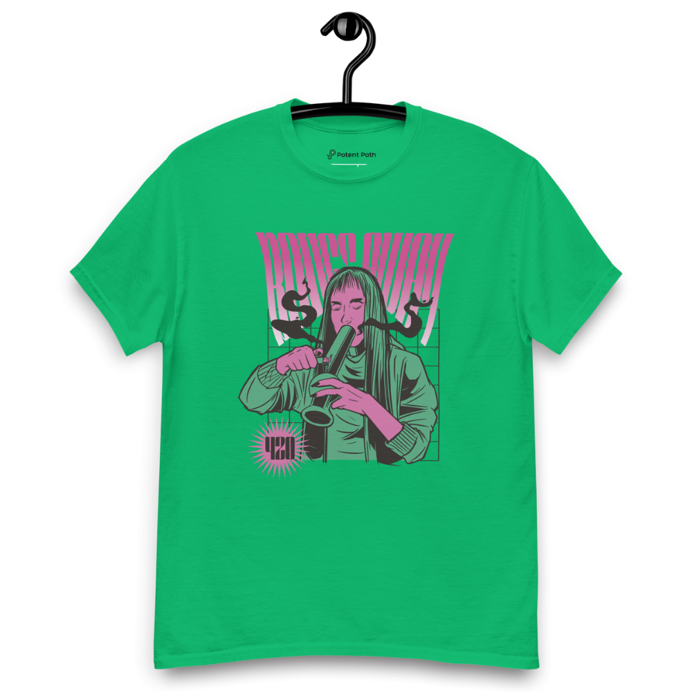 Green T-shirt on a hanger featuring a stylised illustration of a woman with long hair lighting a bong, and the text "BONGS AWAY" distorted above her, along with a small "420" emblem at the bottom left