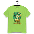 Lime green T-shirt on a hanger featuring a Medusa head smoking a joint with green snake hair, and the text "STONED & UNAPOLOGETIC" below