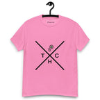 Pink t-shirt on a hanger featuring a minimalist crossed-line design with the letters T, H, C, arranged in the quadrants, and a small green-and-black "P" logo positioned above the centre of the cross