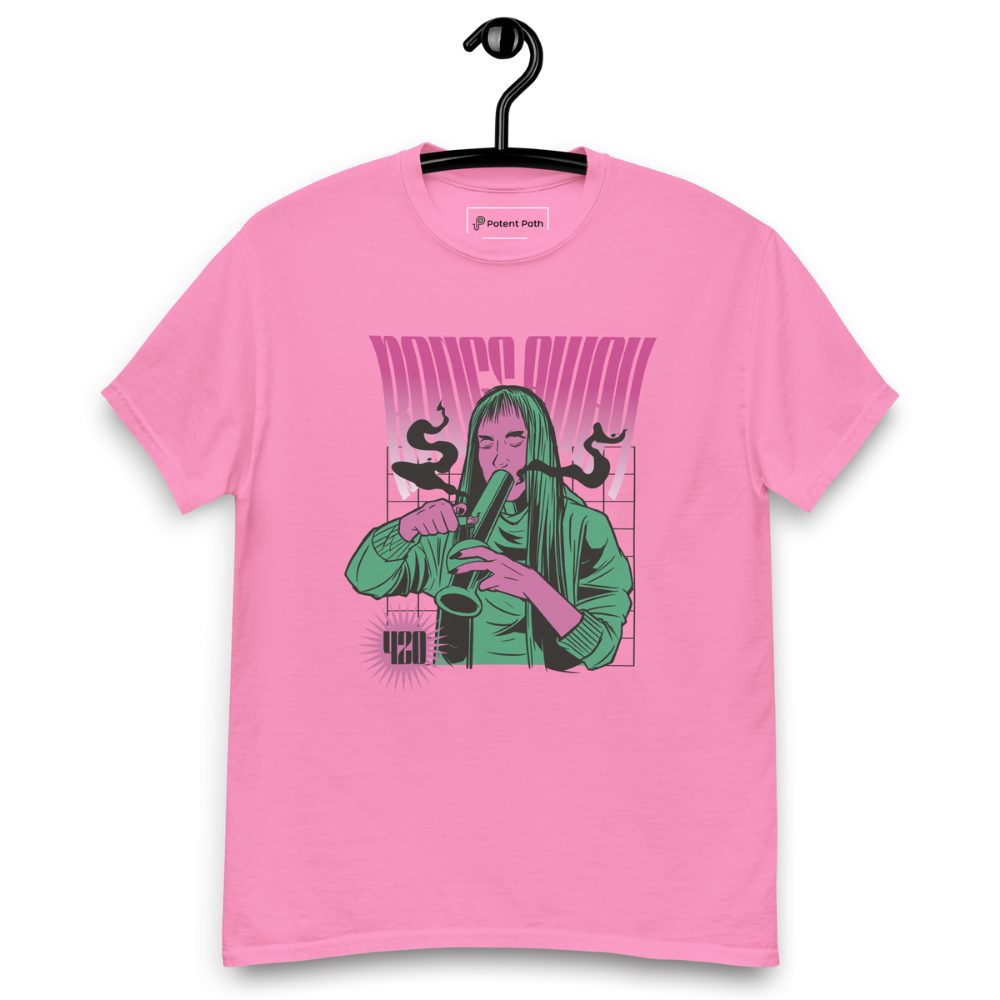 Pink T-shirt on a hanger featuring a stylised illustration of a woman with long hair lighting a bong, and the text "BONGS AWAY" distorted above her, along with a small "420" emblem at the bottom left