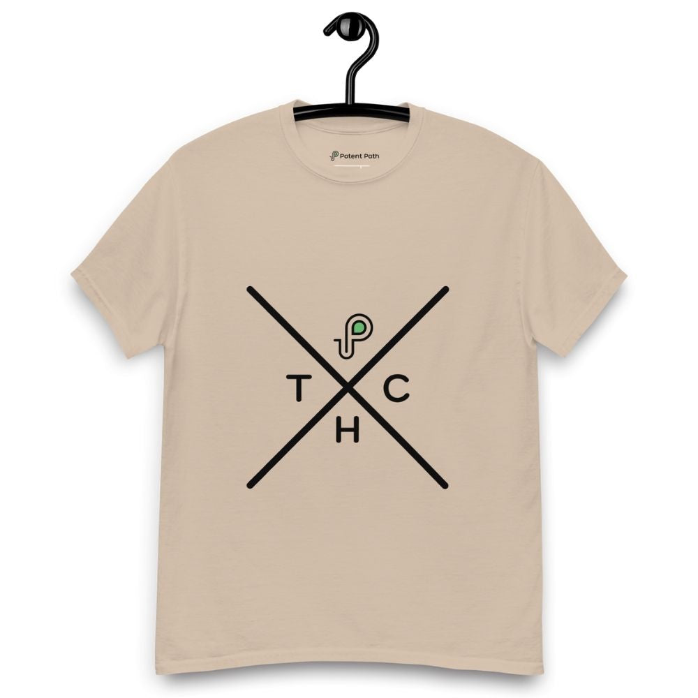 Sandy colour t-shirt on a hanger featuring a minimalist crossed-line design with the letters T, H, C, arranged in the quadrants, and a small green-and-black "P" logo positioned above the centre of the cross