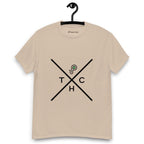 Sandy colour t-shirt on a hanger featuring a minimalist crossed-line design with the letters T, H, C, arranged in the quadrants, and a small green-and-black "P" logo positioned above the centre of the cross