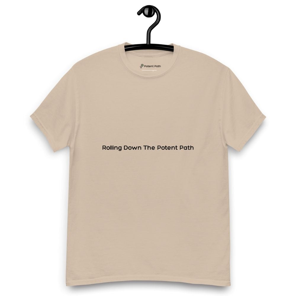 Sandy colour t-shirt on a hanger, featuring centred black text that reads 'Rolling Down The Potent Path'