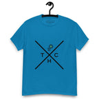 Sapphire blue t-shirt on a hanger featuring a minimalist crossed-line design with the letters T, H, C, arranged in the quadrants, and a small green-and-black "P" logo positioned above the centre of the cross