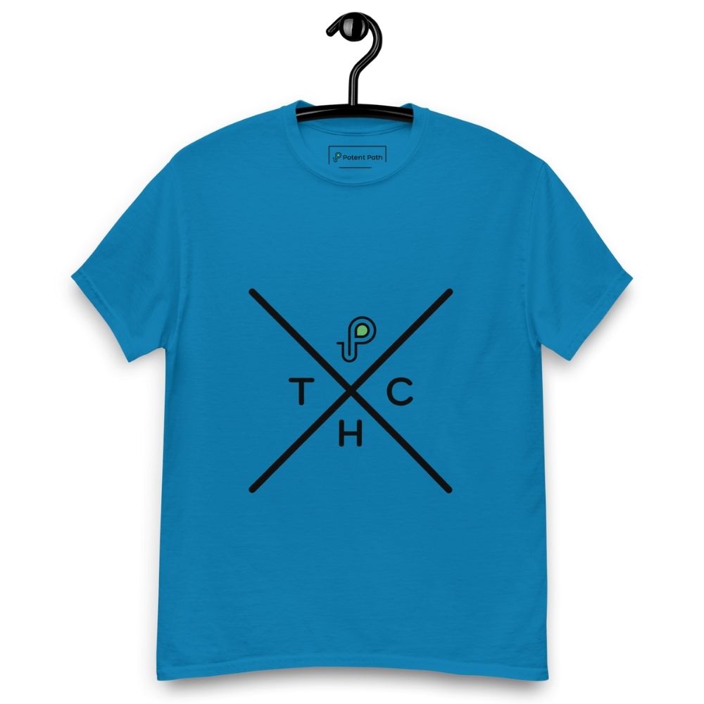 Sapphire blue t-shirt on a hanger featuring a minimalist crossed-line design with the letters T, H, C, arranged in the quadrants, and a small green-and-black "P" logo positioned above the centre of the cross