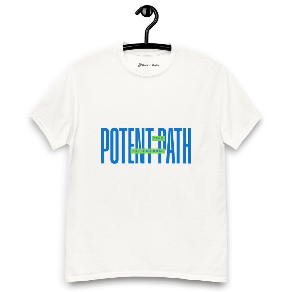 White t-shirt on a hanger featuring large blue text that reads "POTENT PATH," with a small green overlay in the centre containing the words "TAKE THE HIGH ROAD"