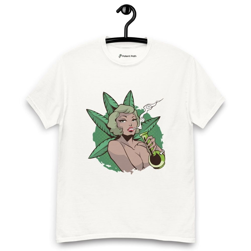 White T-shirt on a hanger featuring a graphic on the chest of a pin-up style woman smoking a joint, framed by large green cannabis leaves