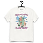 White T-shirt on a hanger featuring a cartoon woman with long green hair, cannabis leaves covering her breasts and smoke clouds behind her, with the text "IN LOVE WITH MARY JANE" above and "MARY JANE" below the illustration.