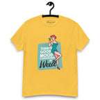 Yellow T-shirt on a hanger featuring a retro-style illustration of a woman in a teal dress holding a smoking joint, next to the text “TODAY'S GOOD MOOD IS SPONSORED BY Weed"