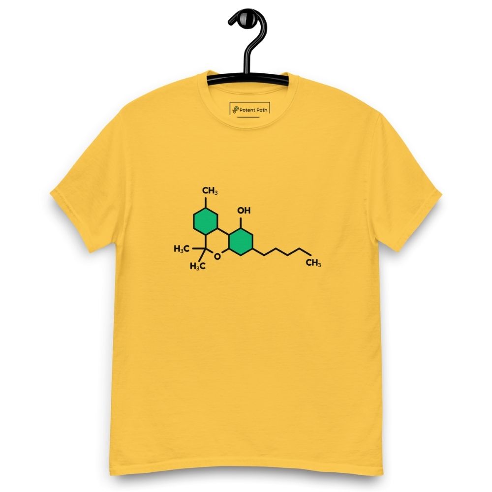 Yellow t-shirt with the THC chemical structure design on its chest, on a hanger against a white background